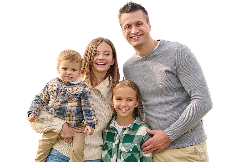 Family Dental Group, homepage picture of a young couple posing together with their two children.